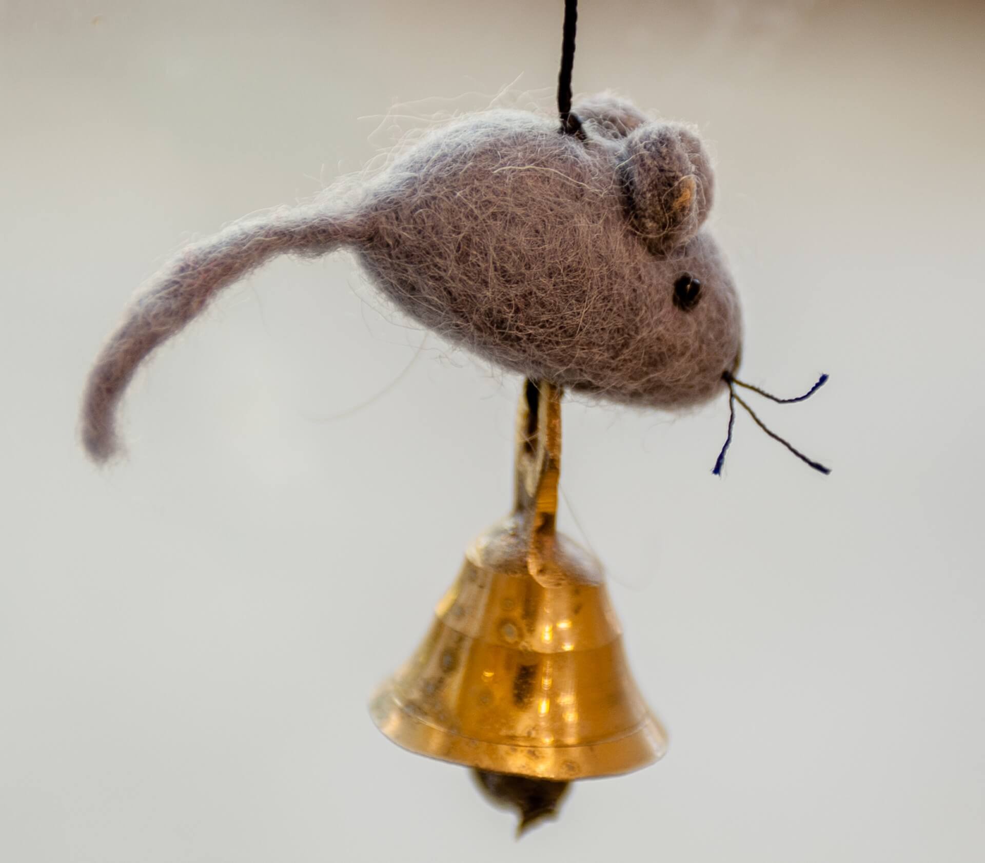 A mouse toy from a bell